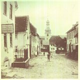 Kalenderbild VR-Bank Untertaunus 1983 Blick durch die Stiftstrasse in Bleidenstadt auf St. Ferrutius (abgebildet im VR-Bank Kalender 1983)